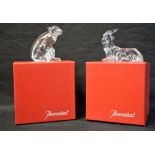 A Baccarat Zodiac Crystal figure, of a monkey, boxed; another, similar, of a seated goat,
