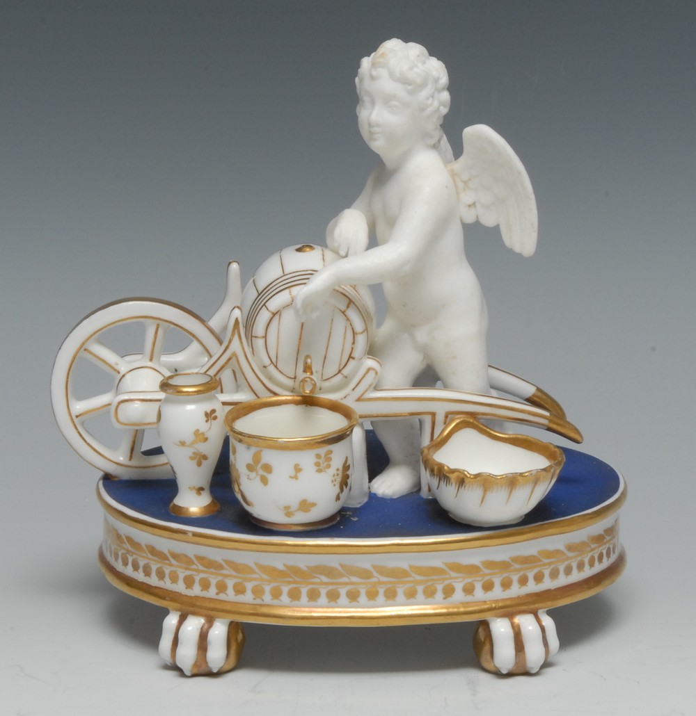 An English porcelain figural inkstand,