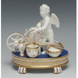 An English porcelain figural inkstand,