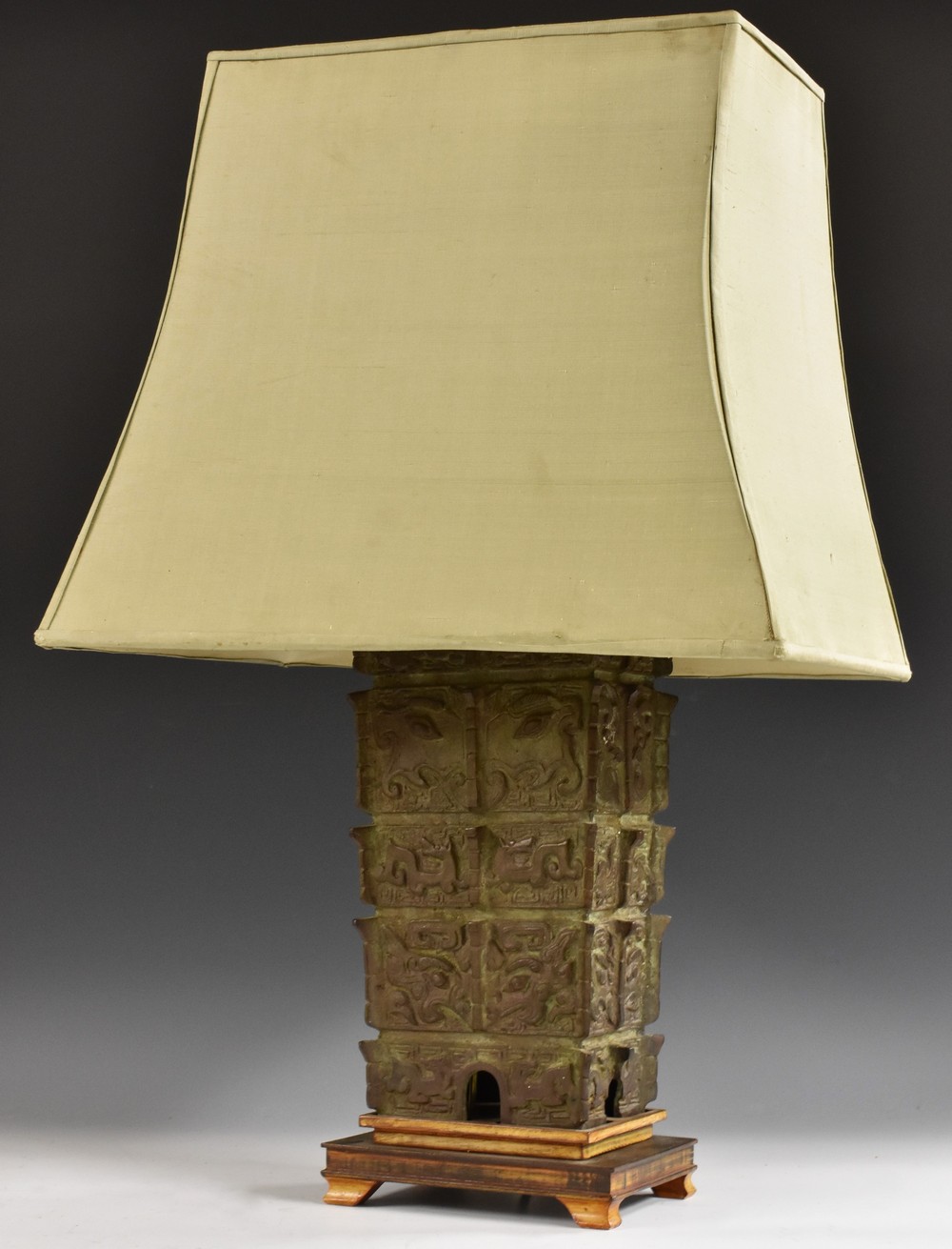 A Chinese verdigris patinated bronze slab-sided table lamp,