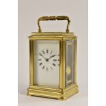 A late 19th century gilt brass carriage clock,