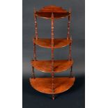 A Victorian rosewood demi-lune four tier whatnot, turned supports, 125cm high, 60cm wide, c.