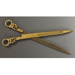 A pair of 18th century Ottoman gold damascened iron Islamic calligrapher's shears, of typical form,