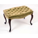 A Victorian rosewood serpentine stool, stuffed over deep buttoned upholstery, cabriole legs,