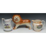 A Victorian Staffordshire lion, standing to the right, glass eyes, coloured in brown, 27cm high, c.