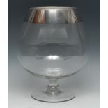 An unusually large silver mounted brandy glass, quite plain, spreading circular base, 30.