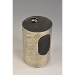 Modern Design - an Elizabeth II silver cylindrical table lighter, bark textured, 9cm high,