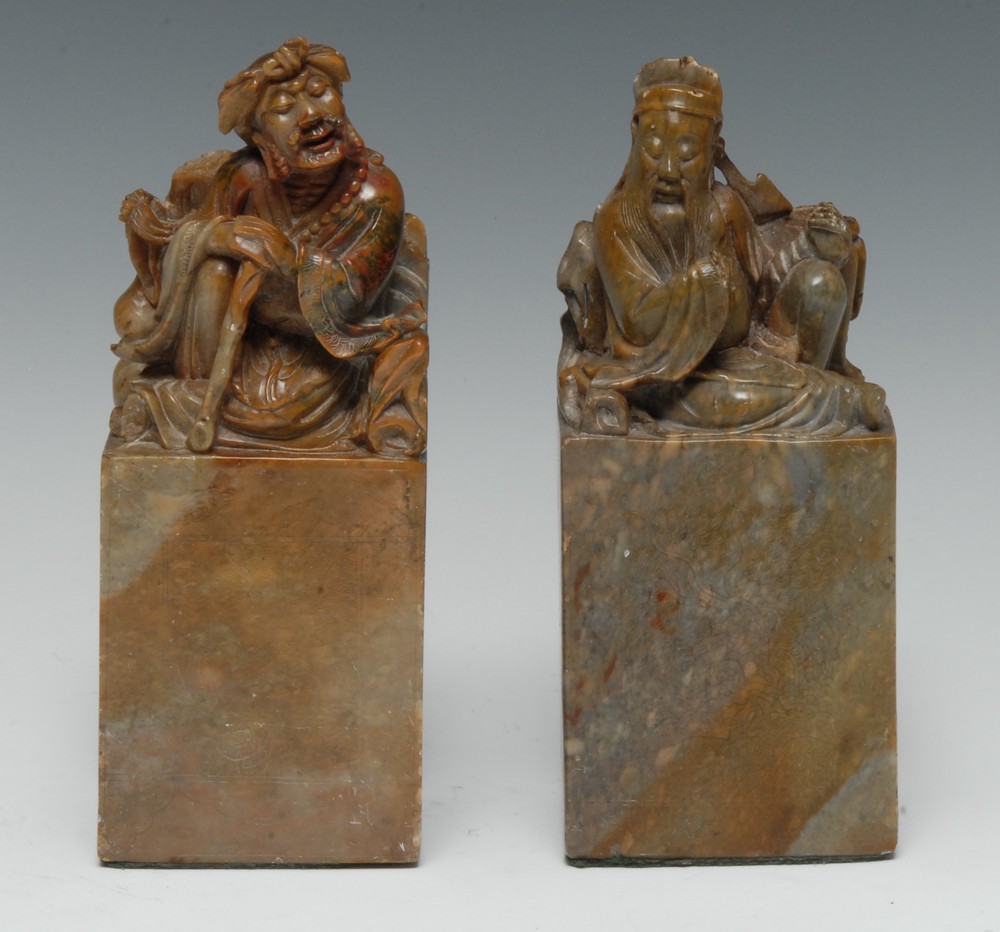 A pair of Chinese soapstone figural seals,