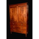 A well figured post-Regency mahogany linen press,