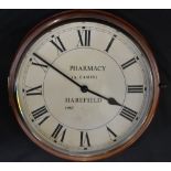 A 19th century style chemist shop mahogany wall timepiece,