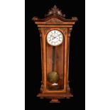 A 19th century walnut Vienna regulator wall clock,