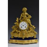 A 19th century French gilt metal mantel clock, 7.