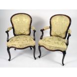 A pair of George III French Hepplewhite mahogany elbow chairs,