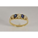 A diamond and sapphire quintet ring,