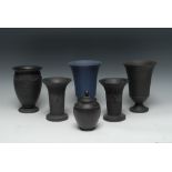 A pair of Wedgwood black basalt flared basket work cylindrical vases,