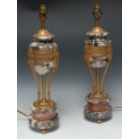 A pair of Empire design marble and gilt metal urnular table lamps,
