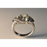 A diamond line ring, central round brilliant cut diamond approx 3.