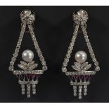 A pair of Belle Epoque style diamond and ruby chandelier earrings,