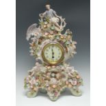 A large German porcelain mantel clock, the 9.