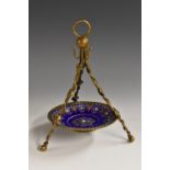 A 19th century French Limoges enamel and gilt metal tripod pocket watch stand,