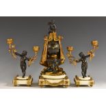 A 19th century French parcel-gilt and dark patinated bronze mantel clock garniture,