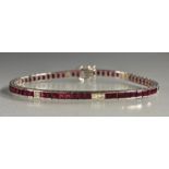 A diamond and ruby tennis bracelet,