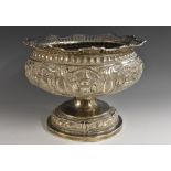 An Indian silver bowed circular pedestal bowl, pierced shaped everted rim,