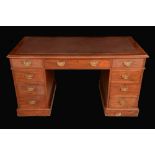 A Victorian mahogany twin pedestal desk, moulded top above three frieze drawers,