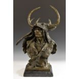 Milo (20th century), a dark patinated bronze, of a Native American Brave, signed in the maquette,