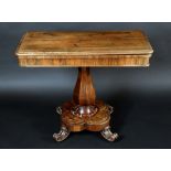 A William IV rosewood rounded rectangular tea table, possibly Irish, folding top with moulded edge,