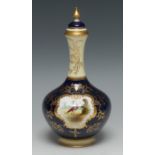 A Coalport bottle vase, decorated with fanciful border within a gilt cartouche,