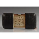 A lady's purse watch, the rectangular champagne dial inscribed Movado, Arabic numerals to quarters,