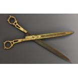 A pair of 18th century Ottoman gold damascened iron Islamic calligrapher's shears, of typical form,