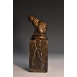 After Barye, a brown patinated animalier bronze, Chat assis (Seated Cat),