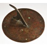 A 19th century bronze circular sundial, engraved with Roman numerals,