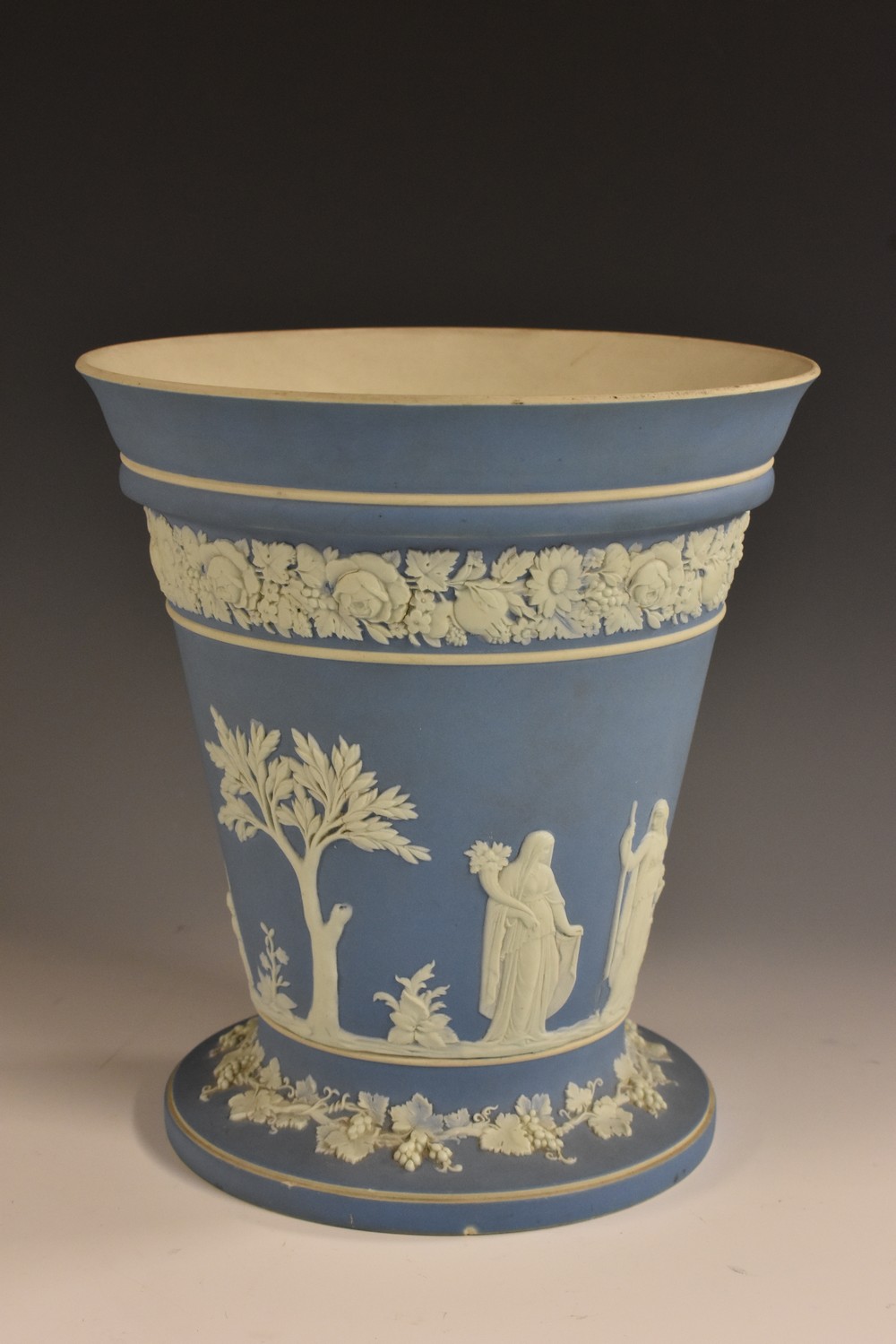 A 19th century Wedgwood pale blue Jasperware tapered cylindrical potpourri vase,