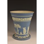 A 19th century Wedgwood pale blue Jasperware tapered cylindrical potpourri vase,