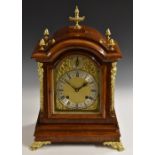 A late 19th century gilt metal mounted oak bracket clock,