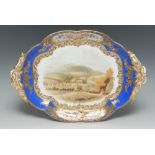 A Worcester two handled shaped oval dish, painted with a view of The Wrekin, Shropshire,