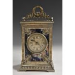 A fine and unusual lapis lazuli and silvered metal mounted repeating carriage clock, 4.