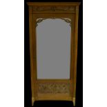 An Art Nouveau ash and marquetry wardrobe, moulded cornice above a deep frieze and a mirrored door,