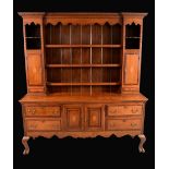 An 18th century style mahogany crossbanded oak dresser,