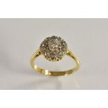 An eleven stone diamond cluster ring,