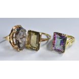 Rings - a 9ct gold rectangular smokey quartz solitaire dress ring, London 1975.