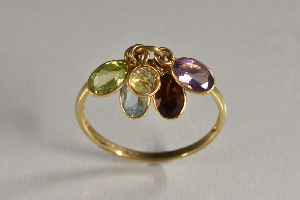 A 9ct gold multi stone droplet articulated dress ring, suspending amethyst, garnet, peridot etc,