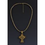 A Renaissance style 18ct gold multi stone gem set cruciform pendant, set with peridot, garnet,