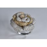 A pave diamond encrusted stylized Rose cluster ring,