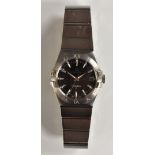 Omega - a gentleman's Constellation quartz wristwatch, ref 123 10 35 60 01 001, textured black dial,