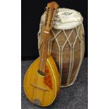 A Cremona mandolin and African hand drum