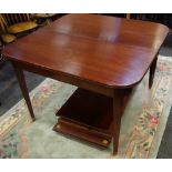 A 20th Century mahogany concertina table,